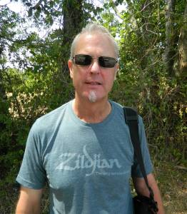 Tom Grignon with Zildjian shirt and bag